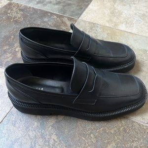 Black leather loafers